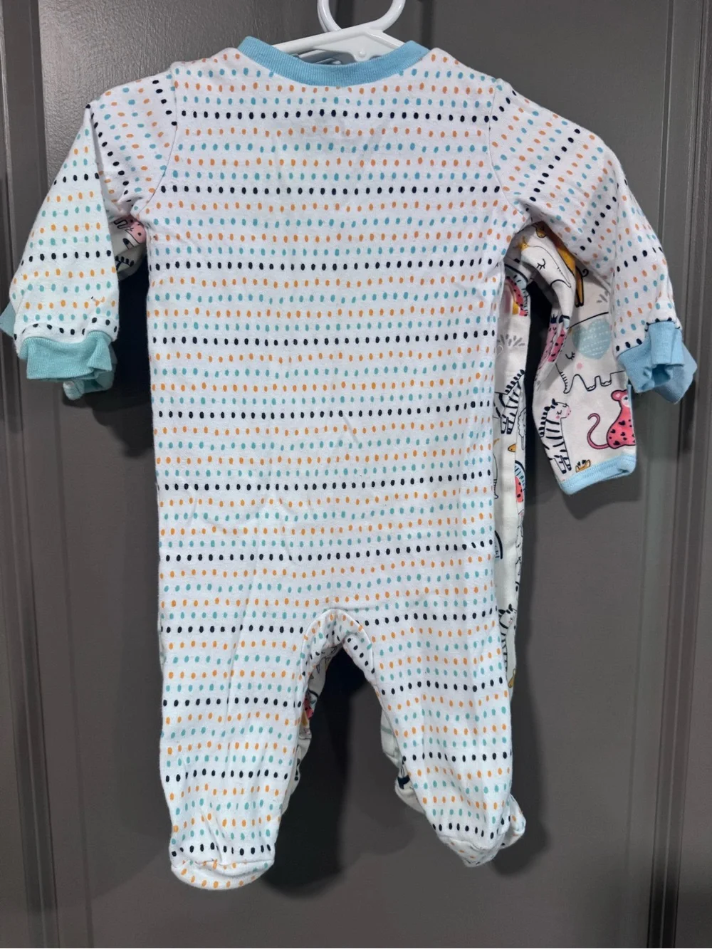 Three piece lot of light weight footed Pajamas, gender neutral.